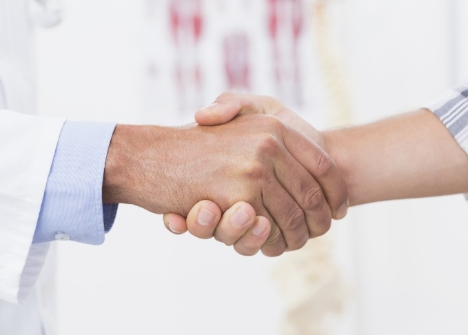 Two people shaking hands